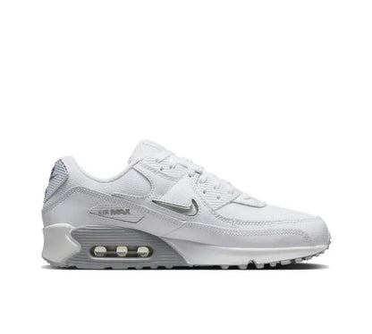 Nike Air Max 90 sneaker in white/grey, side view with visible Air Max unit
