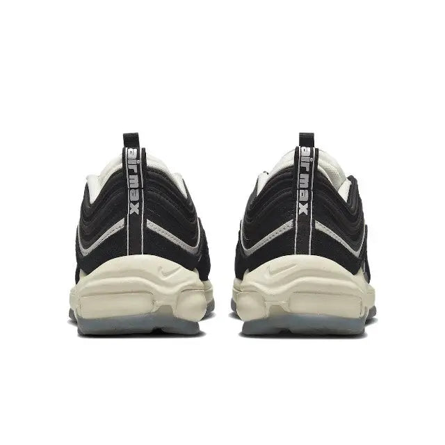 Nike sneaker pair, rear view with black heel and white sole, lace-up