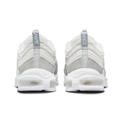 White lace-up sneaker heels with cushioned sole and padded heel tab