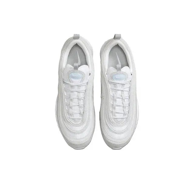 Pair of white low-top sneakers with lace-up uppers and padded collars