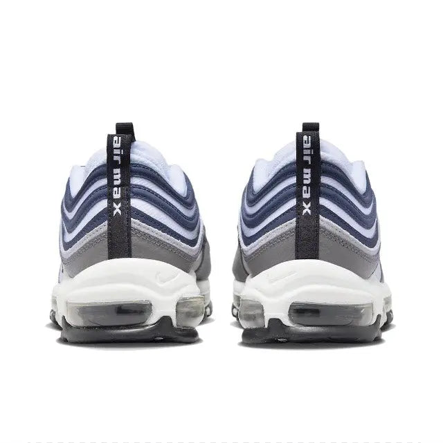 Nike Air Max 97 heel view with Air cushioning, black pull tab, and striped back panel