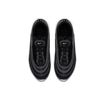 Black low-top sneaker top view with lace-up closure and dark interior lining