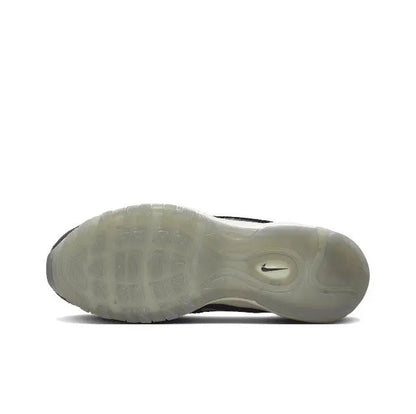 Nike sneaker outsole, light translucent rubber with tread pattern and Swoosh logo