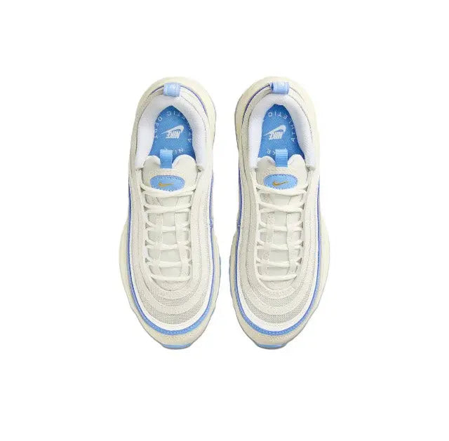 Nike Air Max 97 sneaker pair in sail with blue insoles and lace eyelets