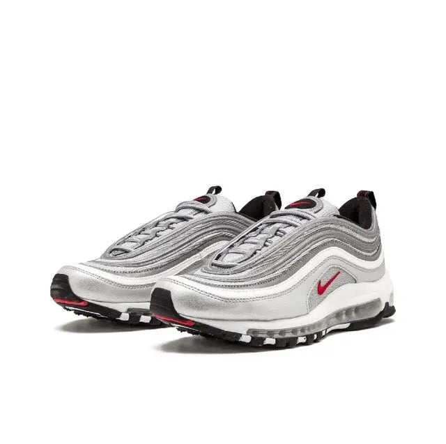 Silver lace-up running sneakers with red swoosh and air-cushioned sole