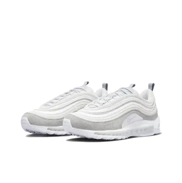 White lace-up running sneakers with layered wave design and cushioned platform sole