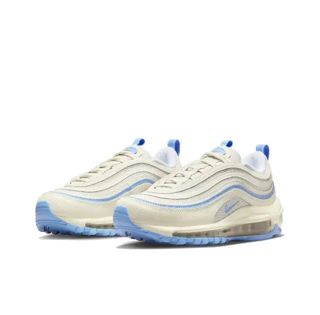 Nike Air Max 97 sneaker pair in sail with blue laces and wavy overlays