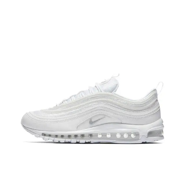 White Nike Air Max 97 sneaker with lace-up front, wavy panels, and Air pods sole.
