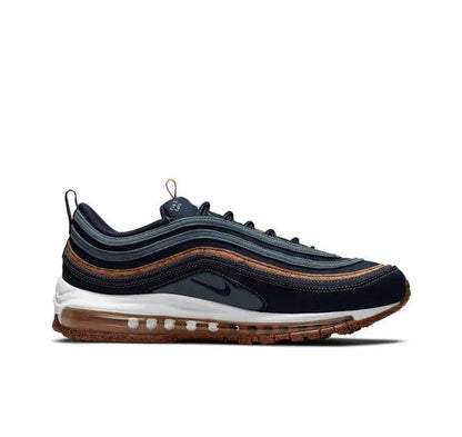 Side view running shoe in dark navy with white midsole, brown outsole, tan lace pull