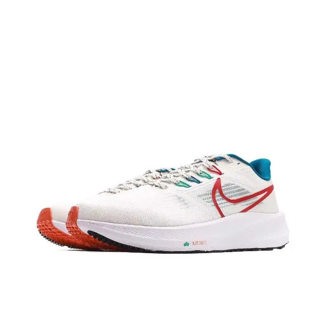 White Nike running shoe side view with red Swoosh and teal lace accents, lace-up
