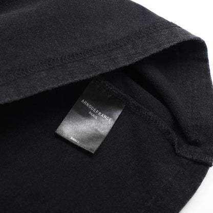 Black T-shirt with interior brand neck label and ribbed collar