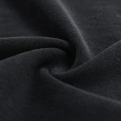 Black T-shirt fabric close-up with soft knit texture