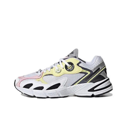 Adidas Astir sneaker, white mesh with black and yellow trim, lace-up.