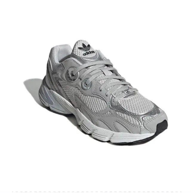 Adidas Astir silver/grey side view sneaker with stripes and chunky sole