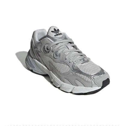 Adidas Astir silver/grey side view sneaker with stripes and chunky sole