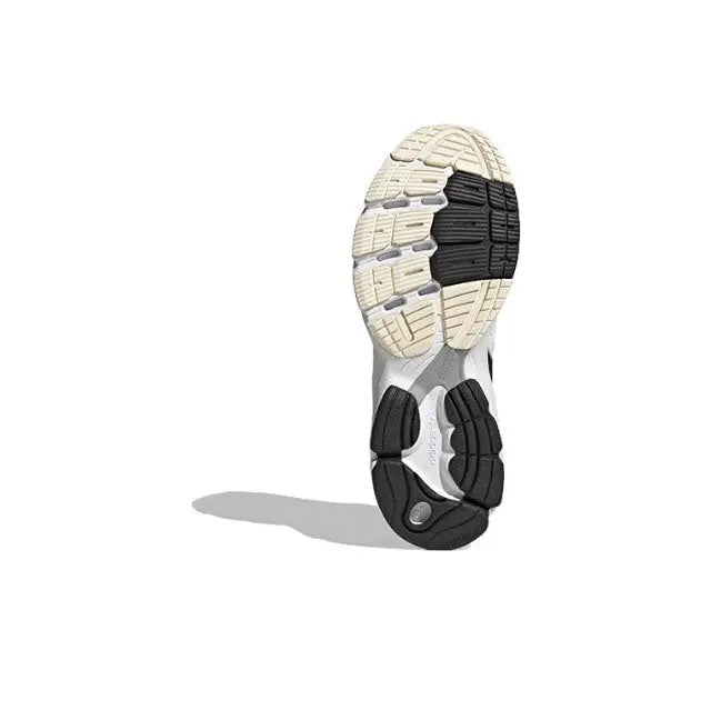 Sneaker outsole with light tread pattern and black rubber grip pods