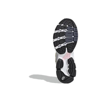 Adidas Astir sneaker outsole, white rubber tread with black traction pattern.
