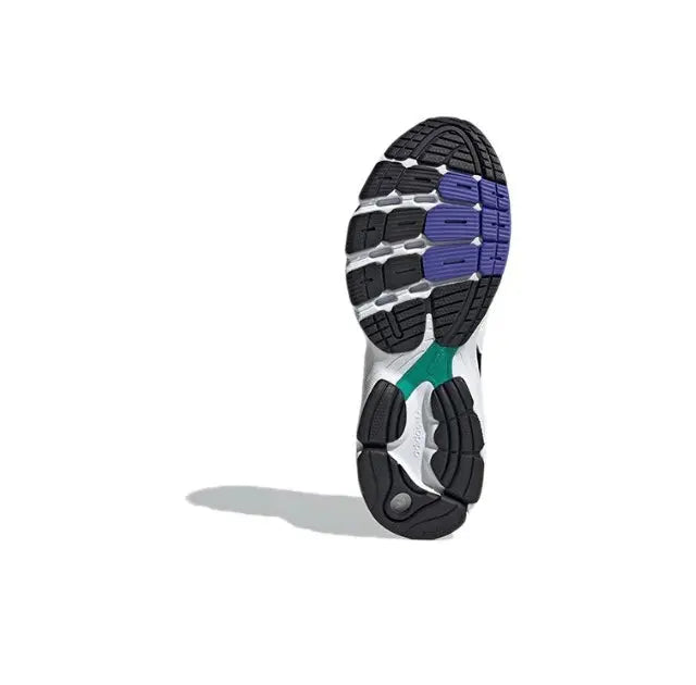 Adidas Astir outsole, black tread with blue and white grip pods