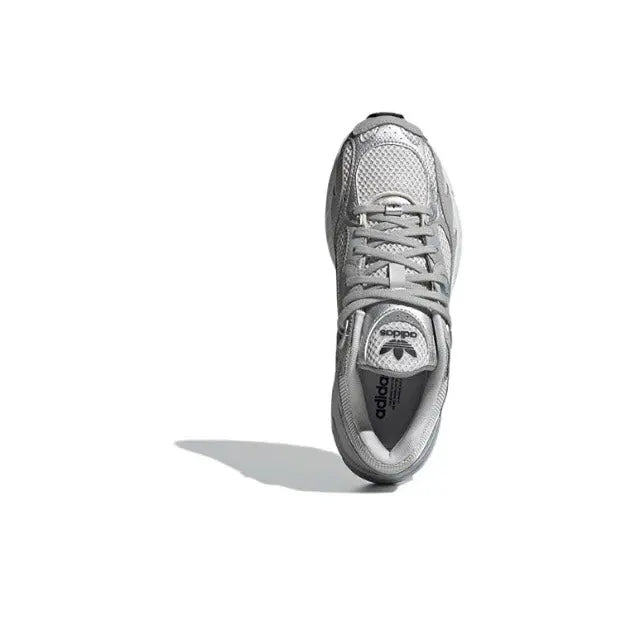 Adidas Astir silver/grey top view sneaker with lace-up and tongue label