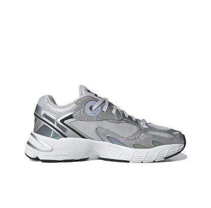 Low-top silver athletic sneaker, diagonal side stripe, lace-up with white midsole.