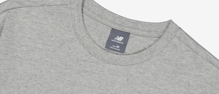Grey crewneck athletic T-shirt with size tag at collar