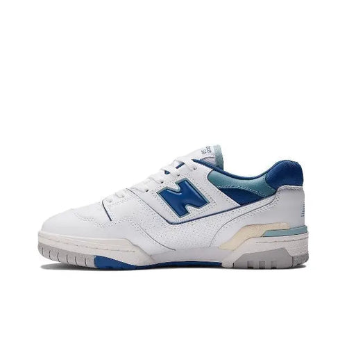Low-top sneaker with white leather and blue accents, beige midsole, lace-up design