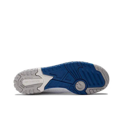 Low-top sneaker outsole with blue traction pods and light gray tread, rubber sole