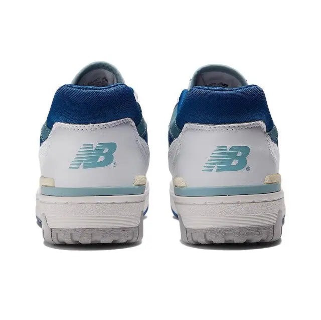 Low-top sneaker heel view with blue collar, white upper, New Balance logo at back
