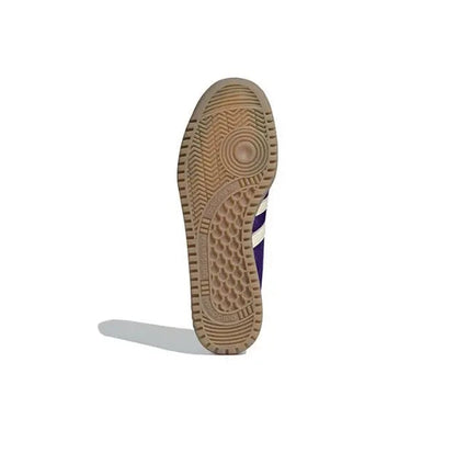 Adidas Bermuda sneaker outsole with textured tan tread and white stripe detail