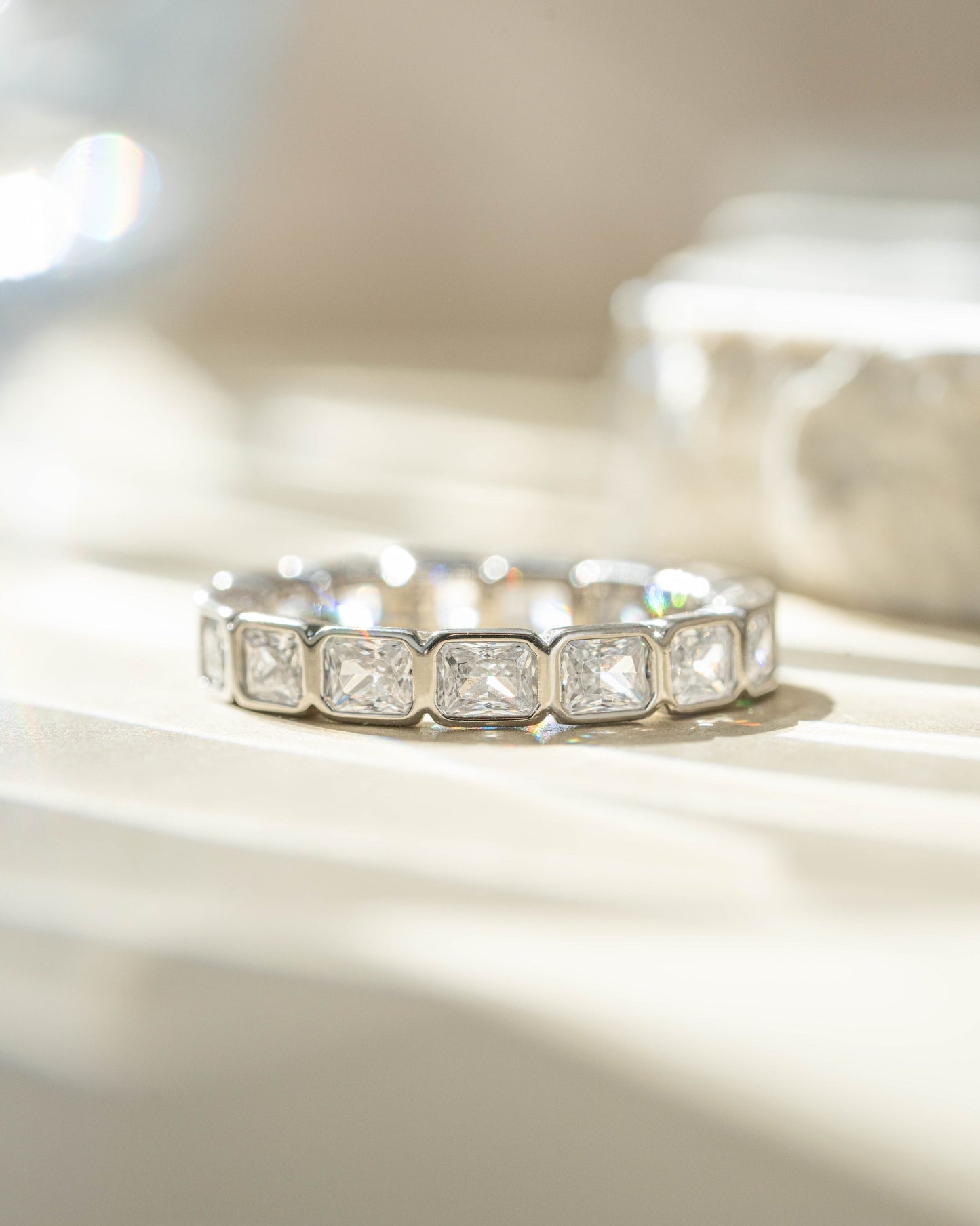 Bezel Emerald Cut Eternity Band