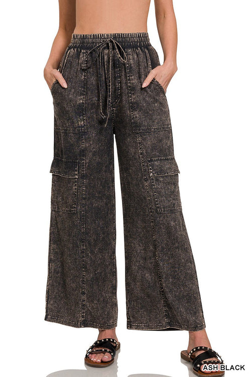 Dark linen-blend wide-leg pants with drawstring waist and cargo pockets