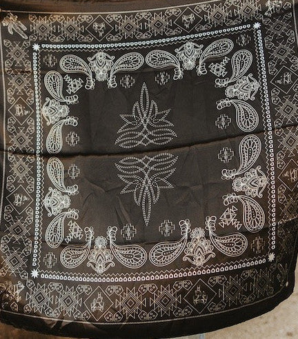 Black wild rag scarf with white paisley and geometric border pattern