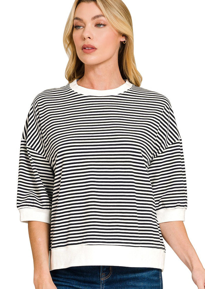 Black-and-white striped 3/4 sleeve T-shirt with crew neck and white cuffs