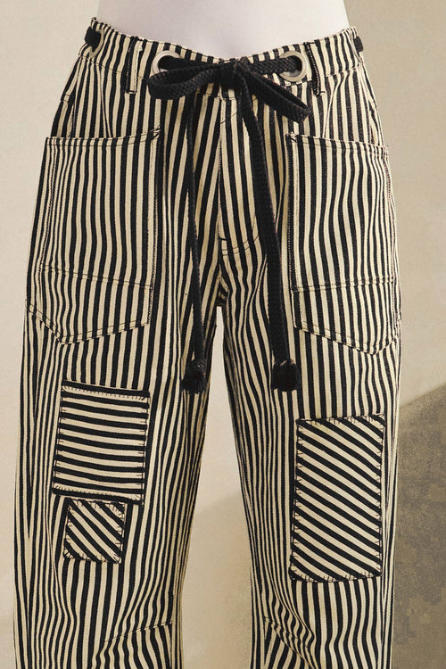 Striped cotton drawstring pants with patch pockets, black and white vertical stripes