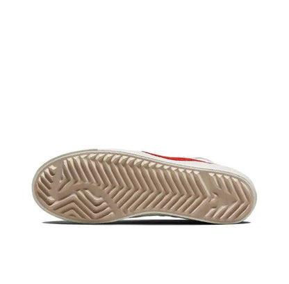 High-top sneaker rubber outsole with herringbone tread and beige traction pattern