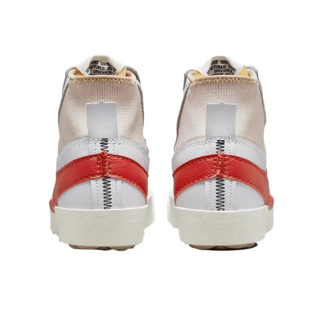 High-top sneakers heel view with white leather, beige lining, red band across heel