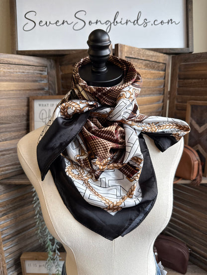 Bridle herringbone wild rag scarf with dark base, cream and brown print, black tails