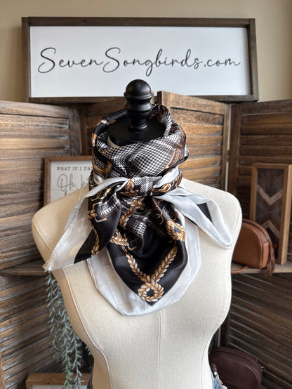 Bridle herringbone wild rag scarf with black-and-cream check pattern and brown accents