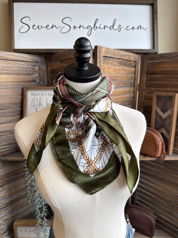Bridle herringbone wild rag scarf with olive green border and cream, black, and brown print