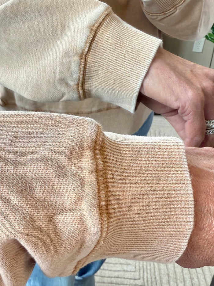 Beige studded crewneck sweatshirt with ribbed cuffs and hem, long sleeves