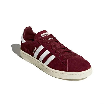 Burgundy Adidas Campus sneakers with white three-stripe side and cream sole