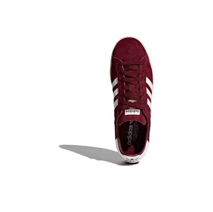 Burgundy Adidas Campus low-top sneakers, lace-up front with white stripes