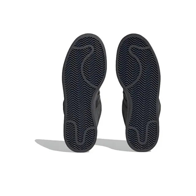 Adidas Campus sneakers outsole pair with textured tread in dark color