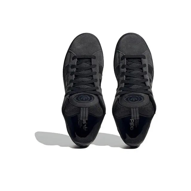 Adidas Campus sneakers, black uppers with lace-up closure and logo detail at toe