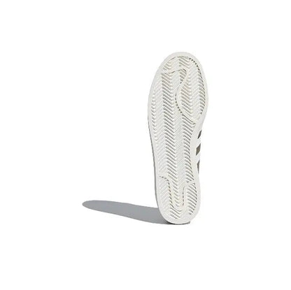 Adidas Campus shoe outsole with textured pattern on white rubber sole