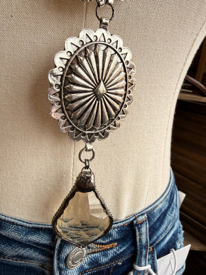 Silver-tone concho necklace with large round pendant and dangle charm