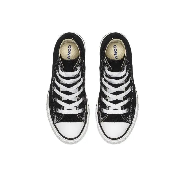 Pair of black low-profile canvas sneakers with white laces and Converse logo heel tabs.
