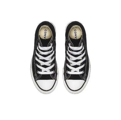 Pair of black low-profile canvas sneakers with white laces and Converse logo heel tabs.
