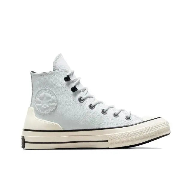 Converse Chuck 70's light blue high-top sneakers with black laces and cream rubber sole
