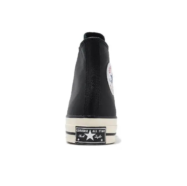 Converse Chuck 70's high-top sneakers, black upper with All Star heel patch and white midsole